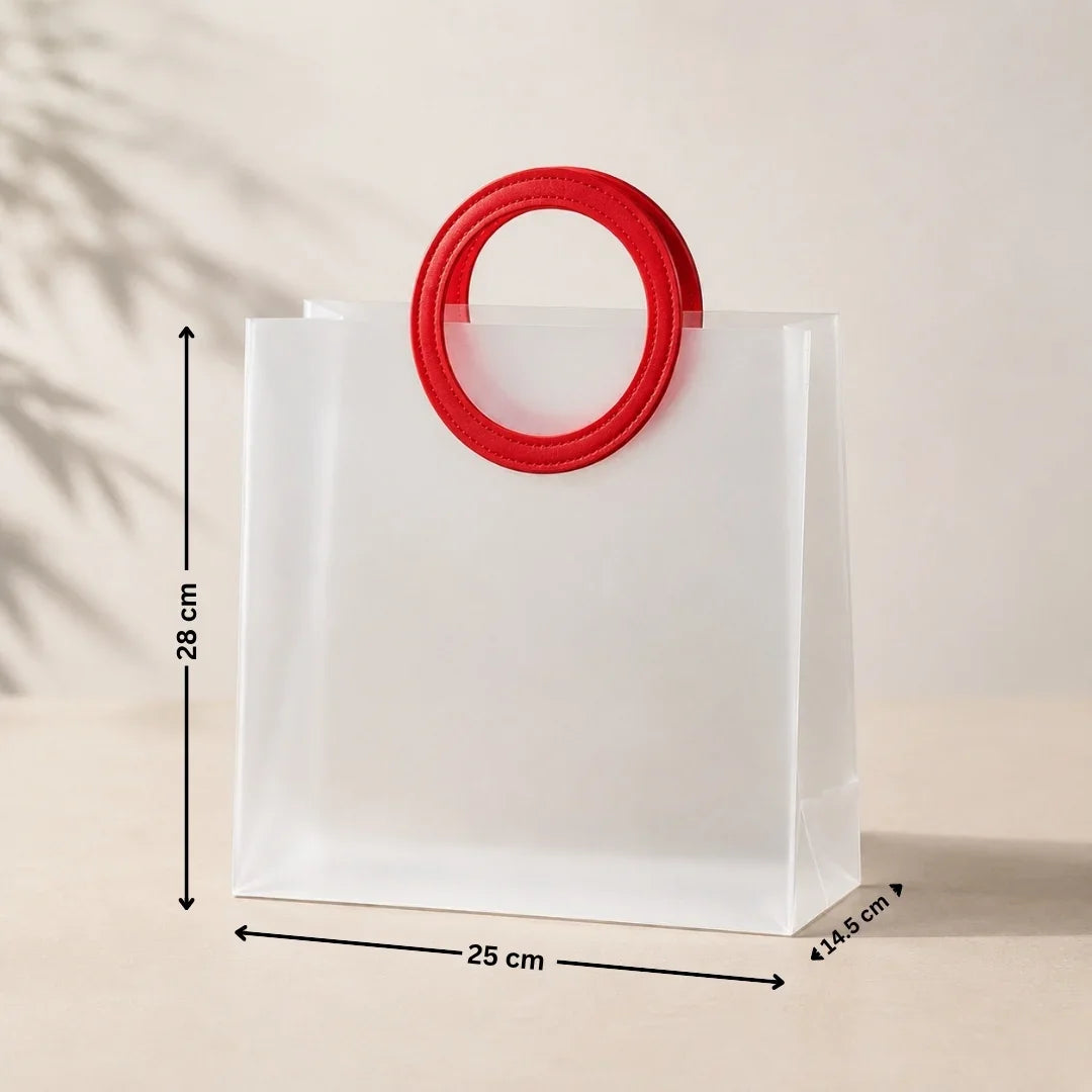 White paper bag with a red circular handle and measurements on a beige background