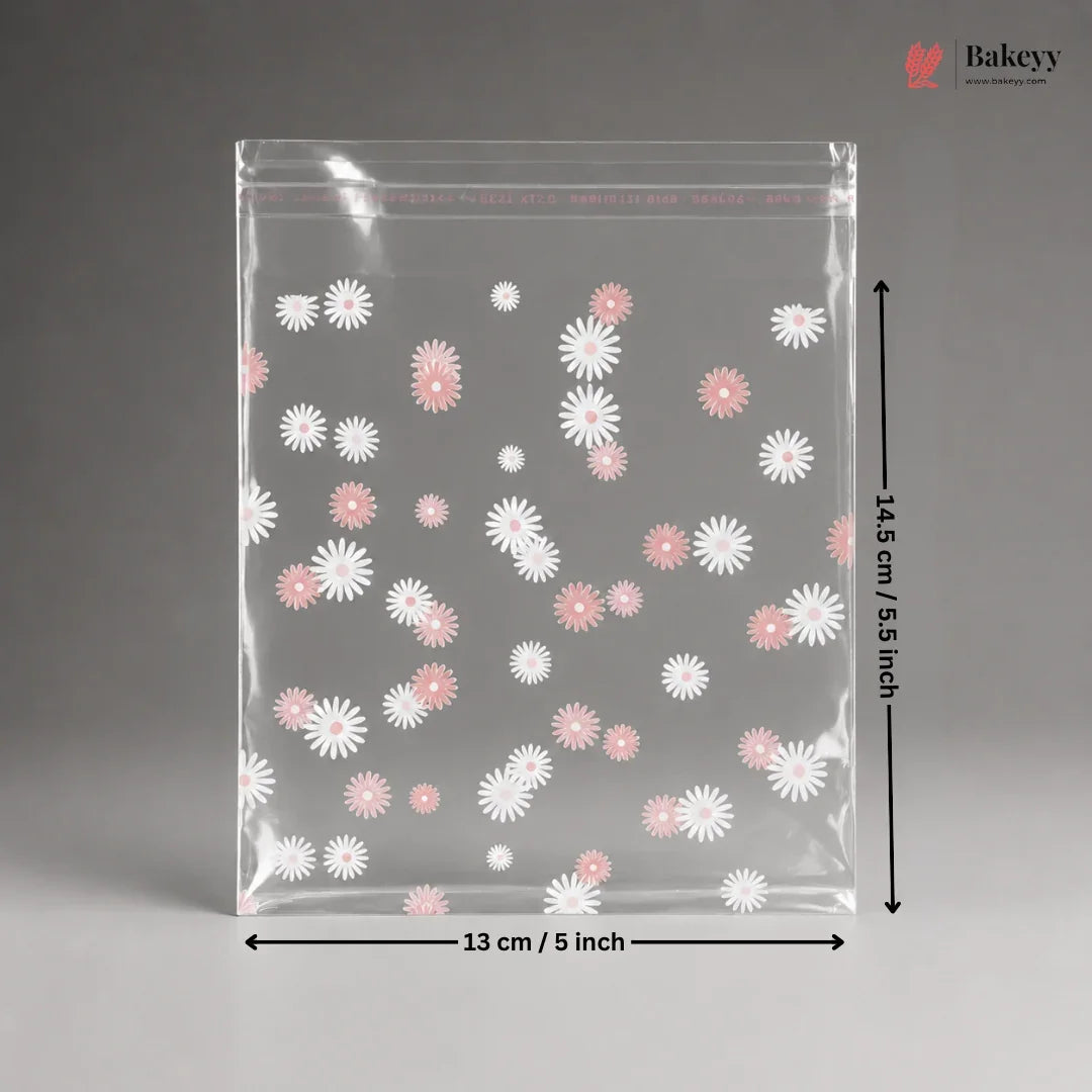 Clear plastic bag with floral pattern and dimensions on a gray background
