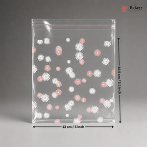 Clear plastic bag with floral pattern and dimensions on a gray background
