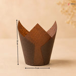 Brown cupcake liner with measurements on a beige background