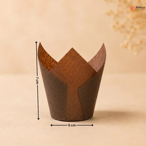 Brown cupcake liner with measurements on a beige background
