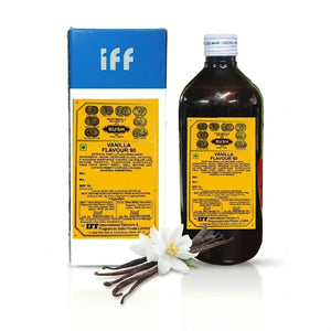 Bottle and packaging of IFF vanilla flavor with vanilla beans and flower on a white background
