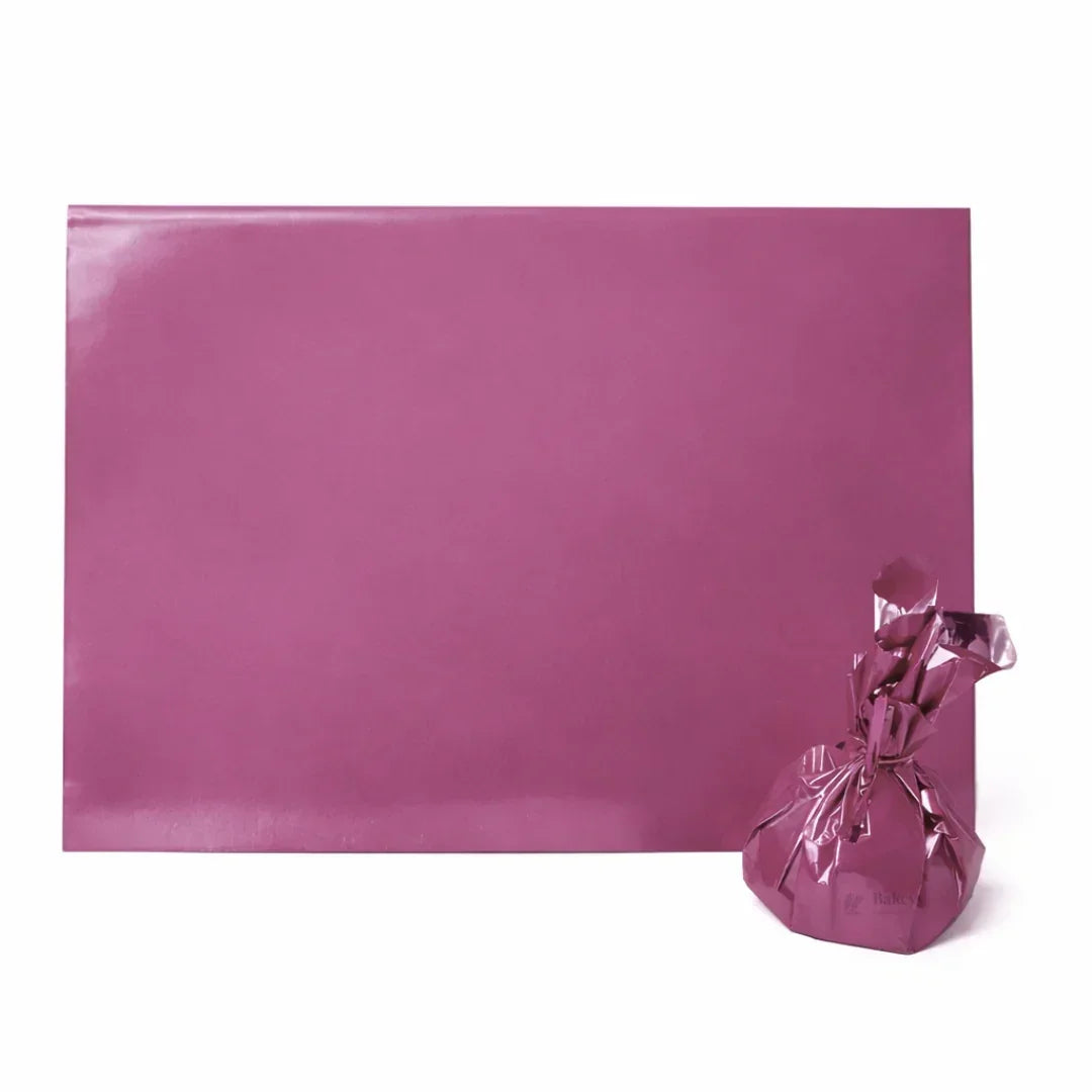 Purple gift wrapping sheet with tied hamper, baking packaging supplies from Bakeyy.com