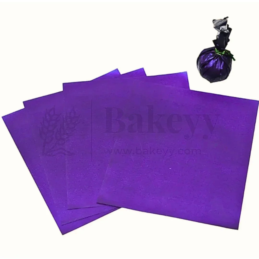 Purple wrapping sheets for bakery gift packaging from Bakeyy, shown with wrapped item
