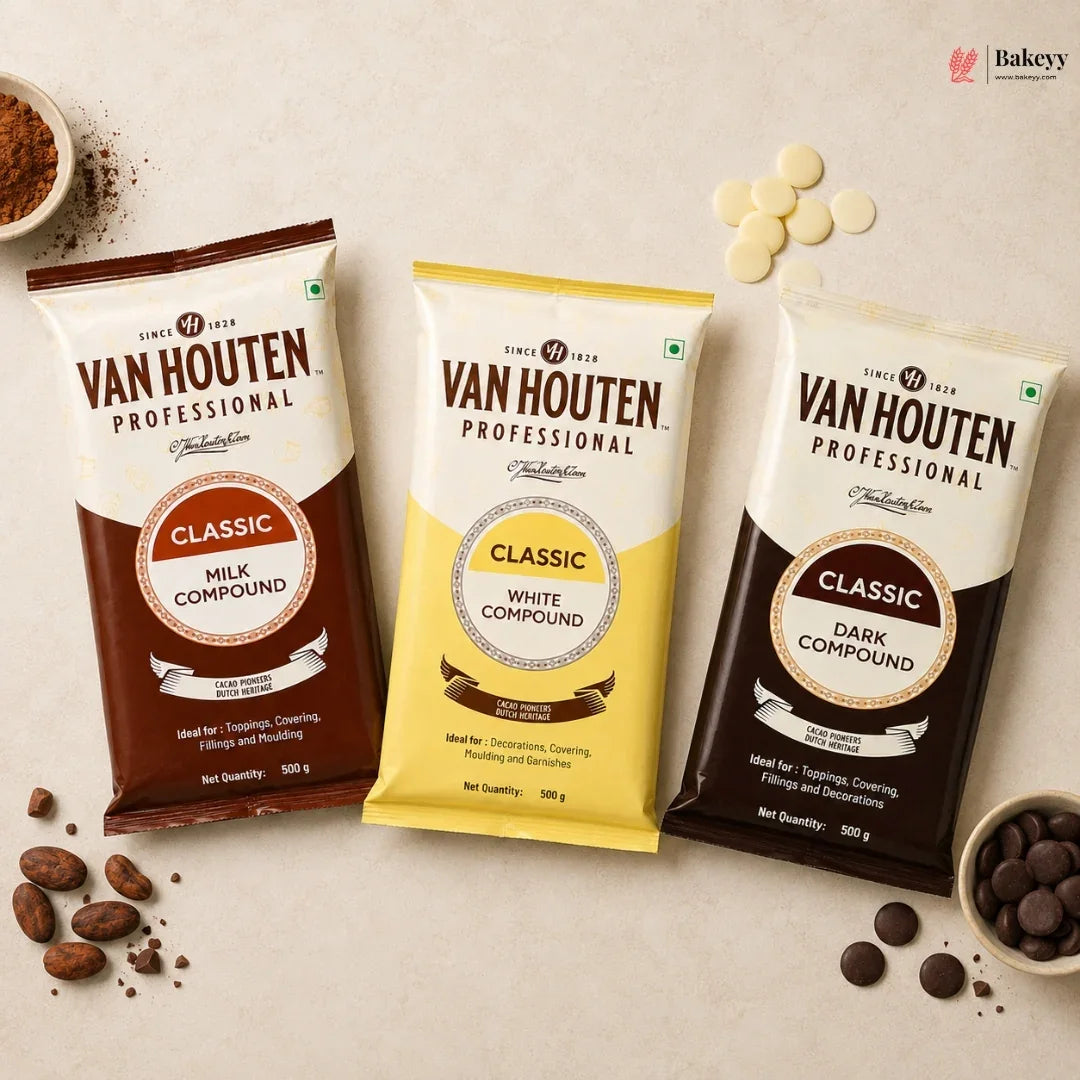 Three Van Houten chocolate compound packages on a light background with chocolate ingredients.
