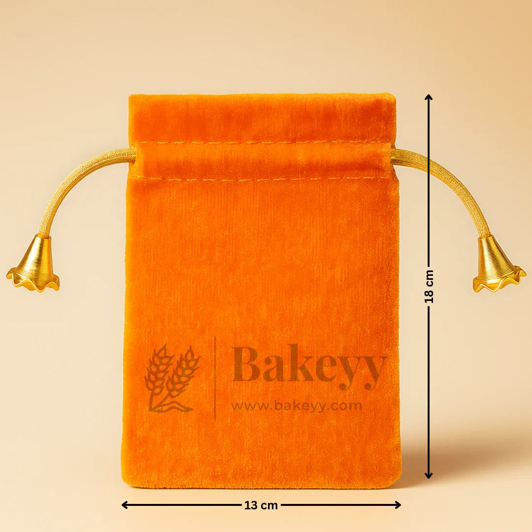 Orange velvet potli bag with gold drawstrings, 13x18 cm, gift packaging from Bakeyy.com