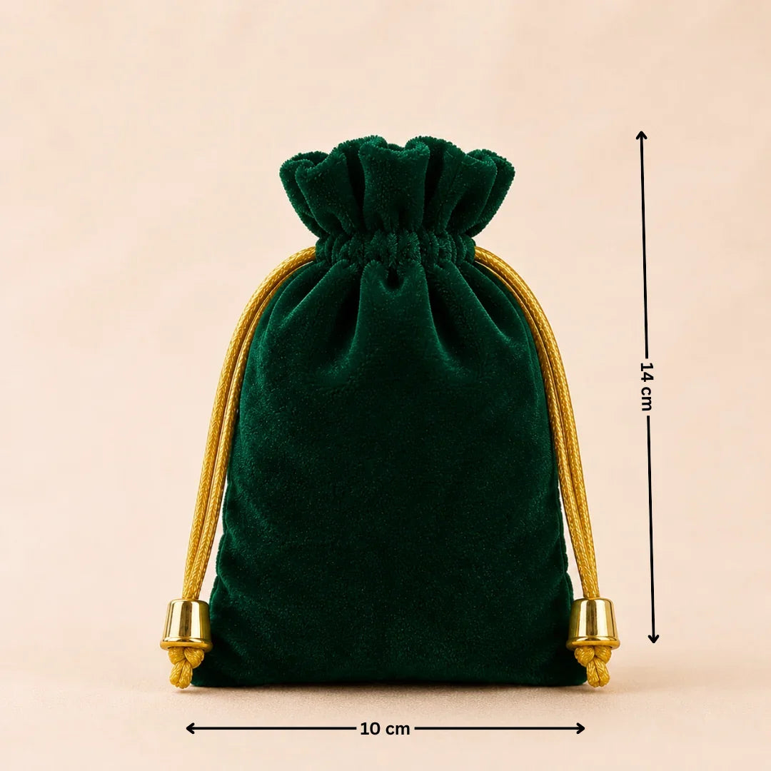 Green velvet drawstring pouch with gold accents and measurements on a beige background