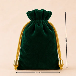 Green velvet drawstring pouch with gold accents and measurements on a beige background