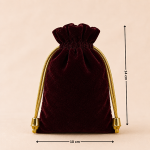 Burgundy velvet drawstring pouch with gold accents and measurements on a beige background