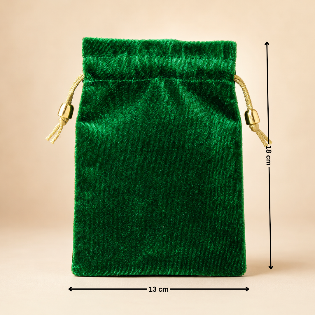 Green velvet drawstring pouch with measurements on a beige background