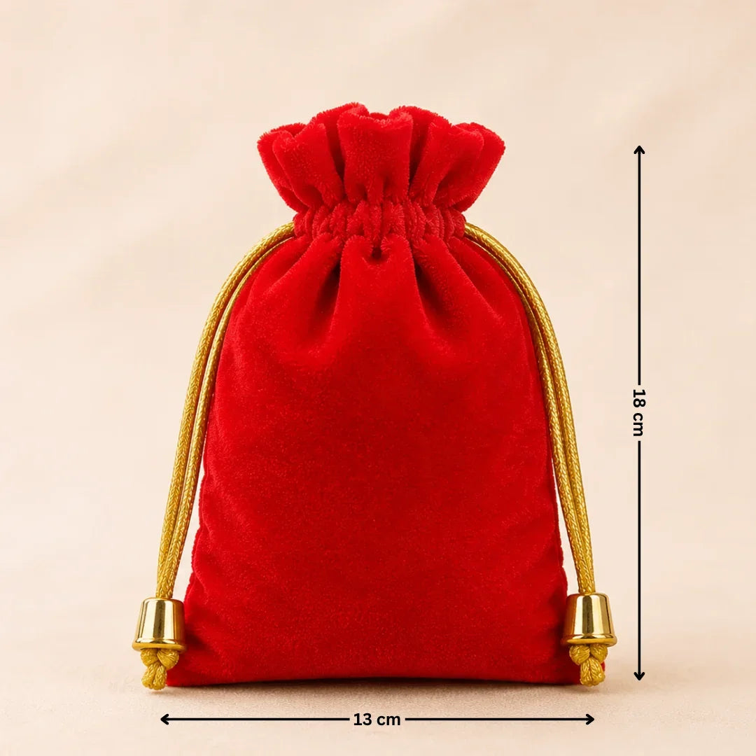 Red velvet drawstring pouch with gold accents and measurements on a beige background