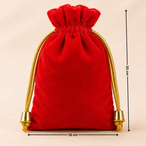 Red velvet drawstring pouch with gold accents and measurements on a beige background