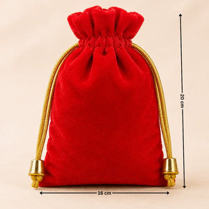 Red velvet drawstring pouch with gold accents and measurements on a beige background