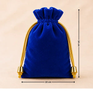 Blue velvet drawstring bag with gold accents and measurements on a beige background