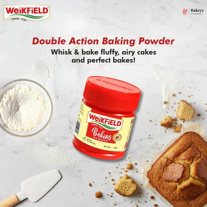 Weikfield baking powder jar with muffin and flour on a light background