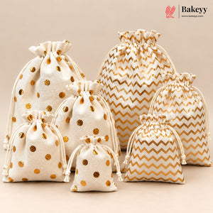 A set of cream drawstring gift bags in various sizes, featuring gold metallic foil patterns including polka dots and chevron stripes. The bags are arranged on a neutral beige background with a Bakeey brand logo in the top right corner.
