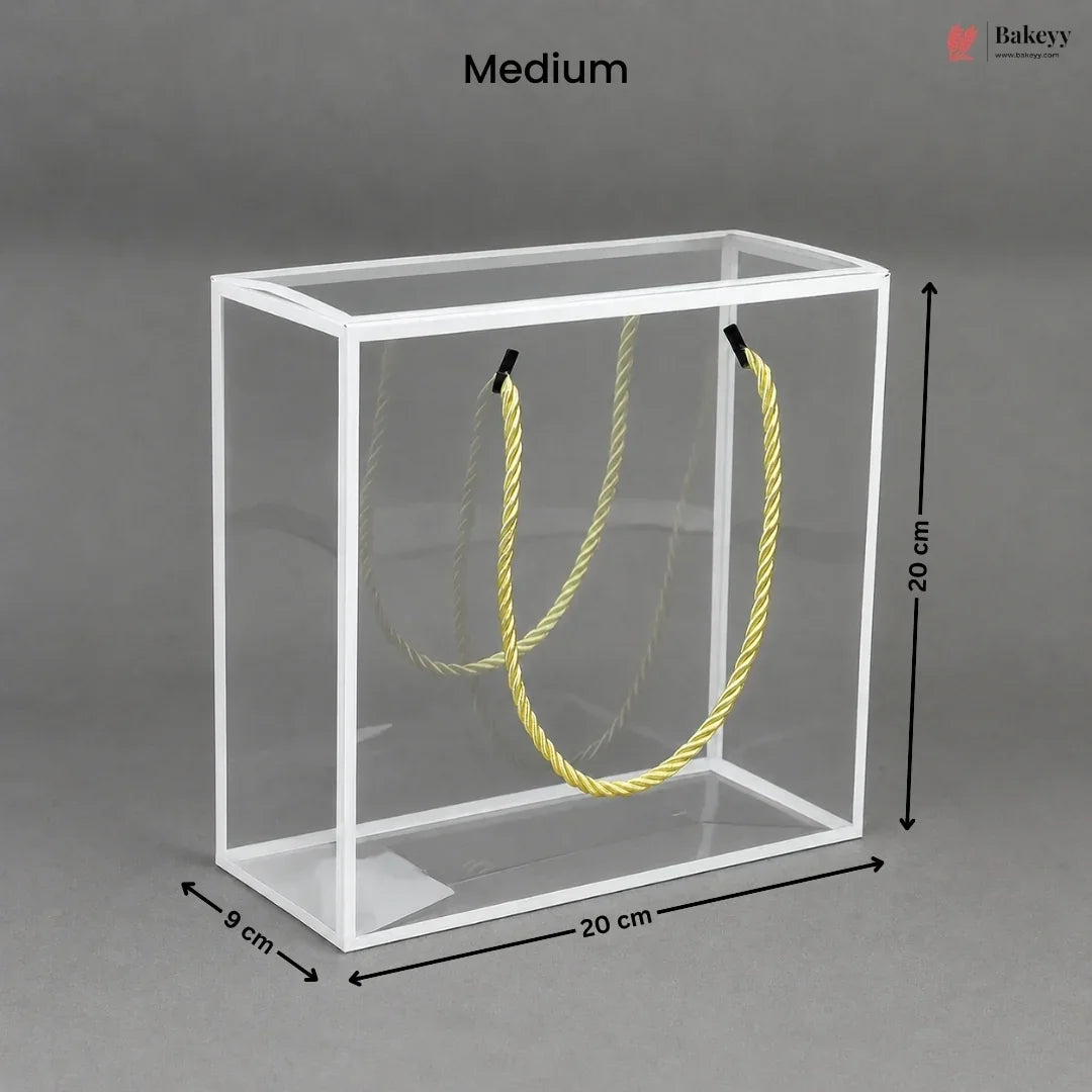 Clear cube with yellow rope inside, dimensions labeled, on a gray background