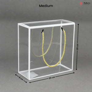 Clear cube with yellow rope inside, dimensions labeled, on a gray background