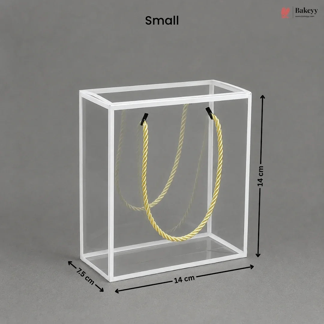 Small clear cube with yellow rope inside, dimensions labeled, on a gray background