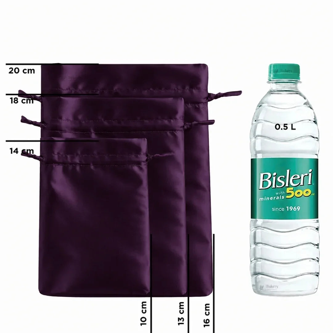 Three dark purple satin drawstring pouches of different sizes shown next to a 0.5 L Bisleri mineral water bottle for scale, with printed size measurements in centimeters.