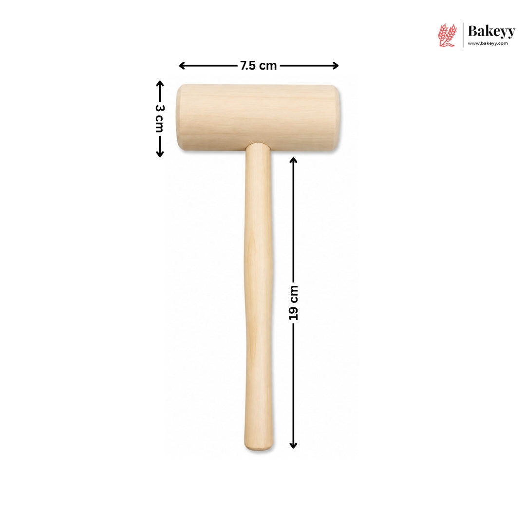 A wooden cake or pastry hammer with a light natural wood handle and head, shown on a white background with black dimension arrows and labels indicating 7.5 cm head width, 3 cm head height, and 19 cm handle length.
