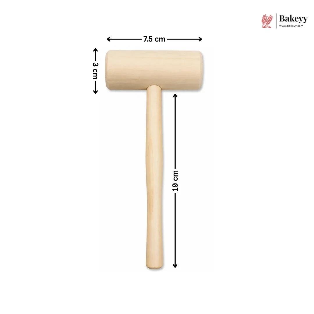 A wooden cake or pastry hammer with a light natural wood handle and head, shown on a white background with black dimension arrows and labels indicating 7.5 cm head width, 3 cm head height, and 19 cm handle length.