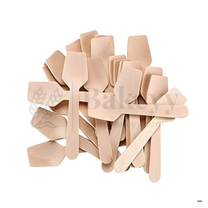 Stack of flat wooden spatula spoons for baking supplies on white background, Bakeyy.com