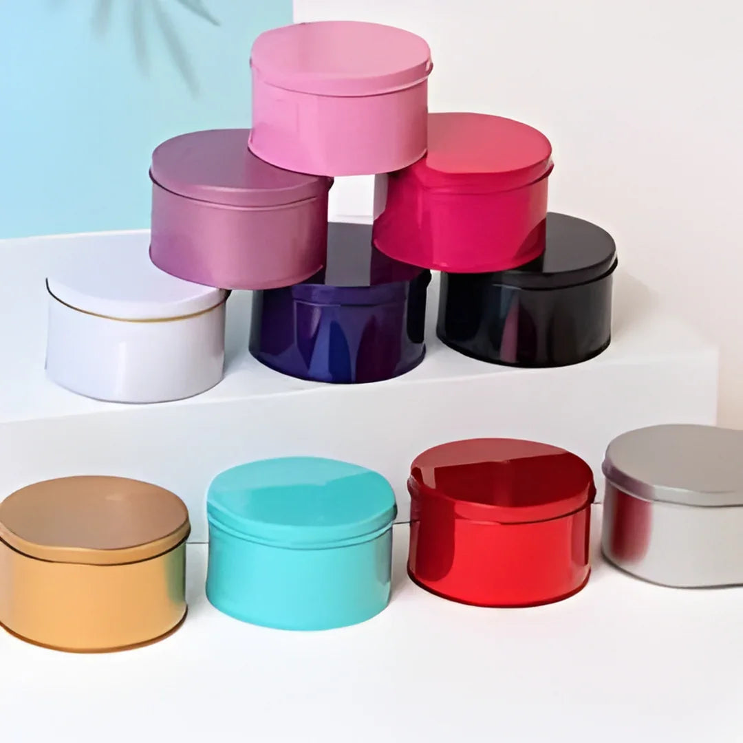 Colorful round tin boxes for gift packaging displayed on white steps, Bakeyy baking supplies