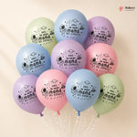 Pastel-colored balloons with text on a beige background