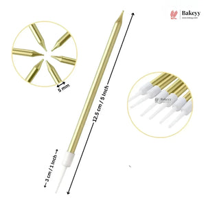 A single gold metal cake topper with multiple pointed tips, shown on a white background with dimension labels indicating 12.5 cm length and a 3 cm tip width.