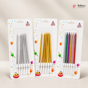 Three packages of plastic birthday cake candles in assorted colors, including silver, gold, green, pink, purple, and red, displayed on a light beige background with the Bakeyy brand logo in the top right corner.