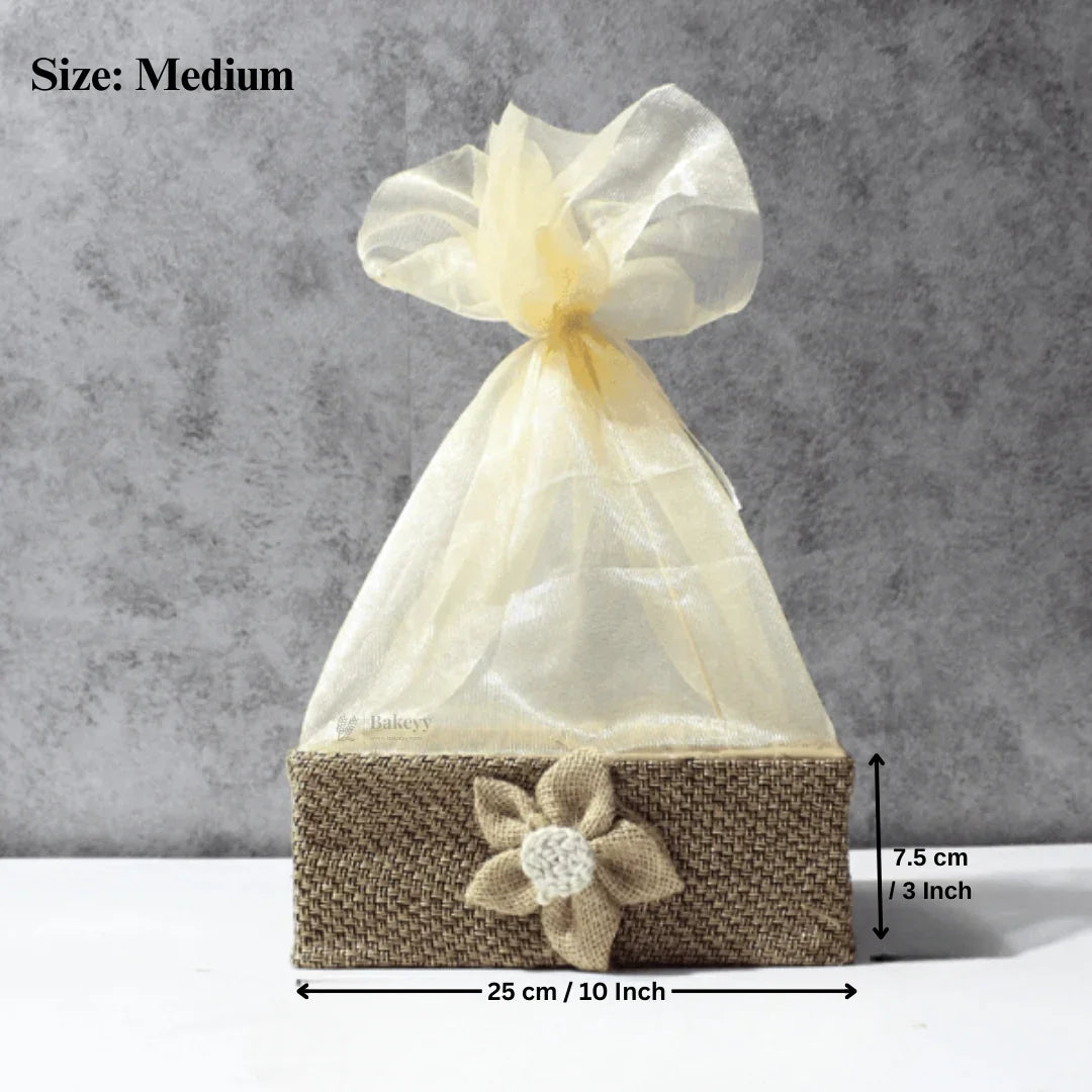 Medium brown net basket with jute flower decoration, ideal for gift packaging or hampers from Bakeyy.com