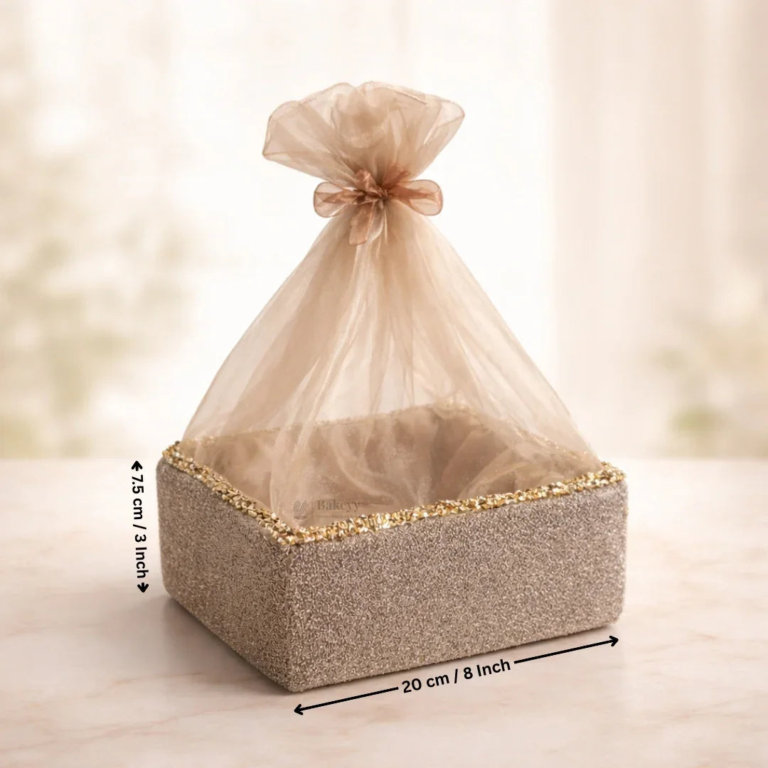 Gold net hamper basket with decorative trim, 20x15.5cm, gift packaging from Bakeyy India.