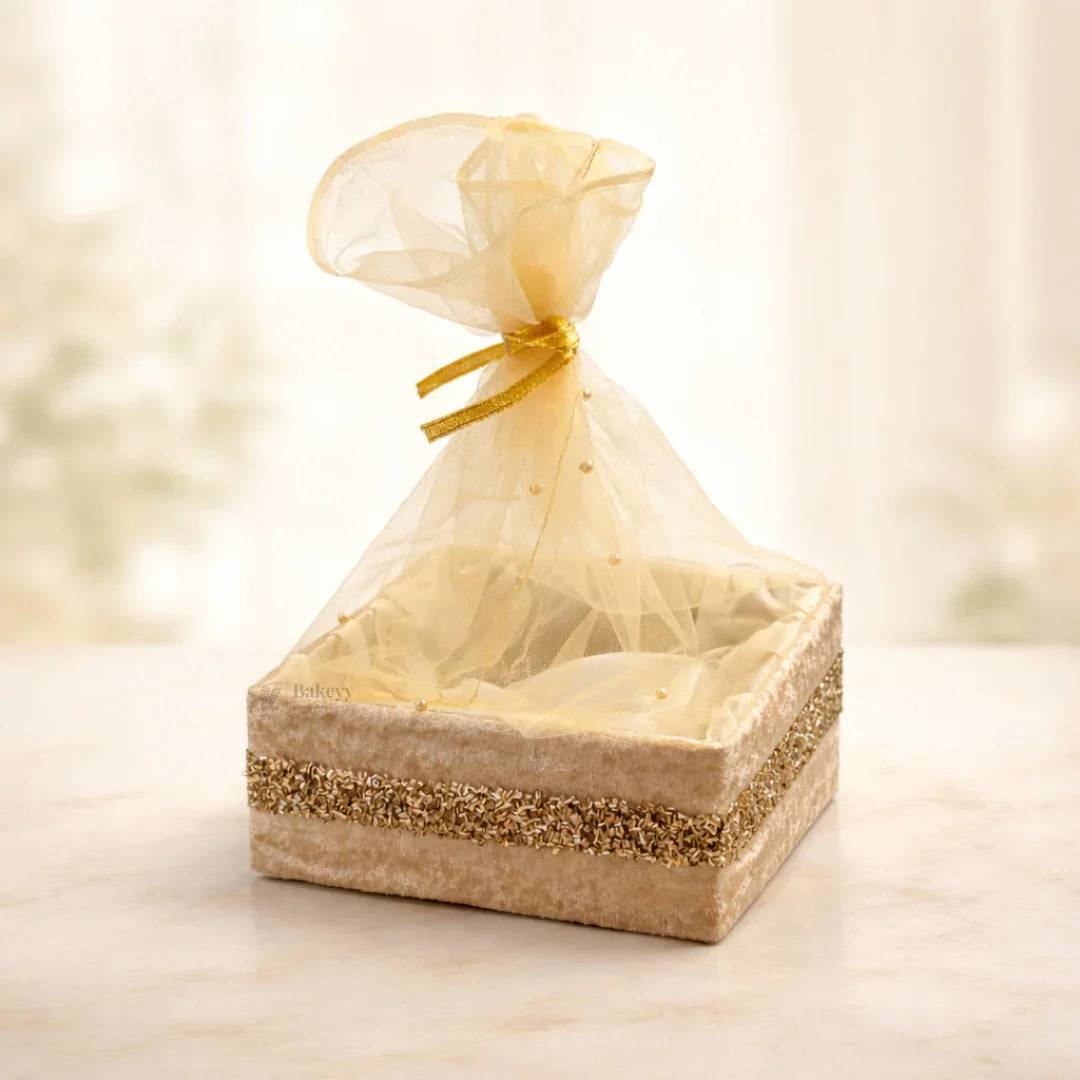 Elegant gold velvet net basket for gift packaging from Bakeyy, ideal for hampers and baking supplies