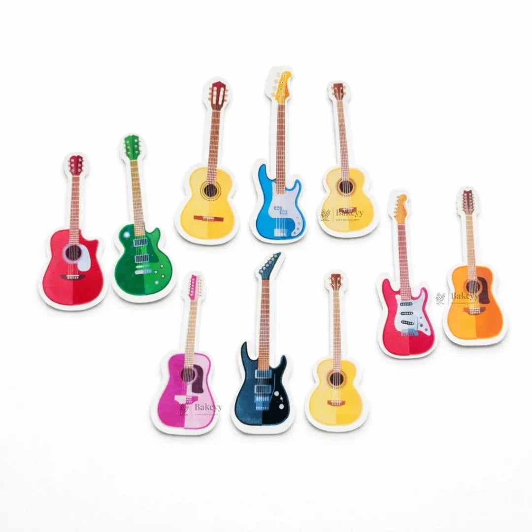 Colorful guitar-shaped precut edible wafer toppers from Bakeyy for cake decorating
