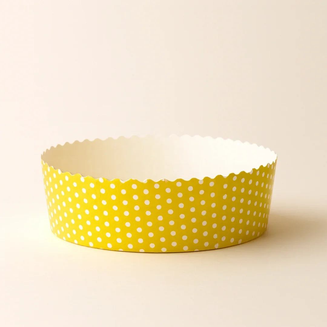 Yellow round polka dot bake and serve paper mold from Bakeyy for baking supplies