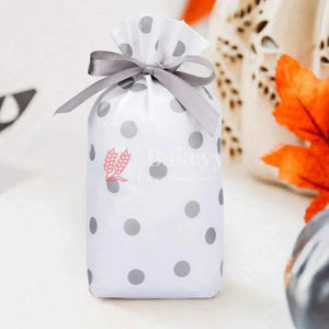 silver-big-dots-plastic-stand-up-treat-favor-bags-gift-wrapper-bags-for-candy-cookie-chocolate-or-pack-of-25-bakeyy-com-1 - Bakeyy.com