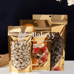 ziplock_pouch_gold_standing_image1_60ead125-eee9-448a-ac56-faf0c60c6d6f - Bakeyy.com