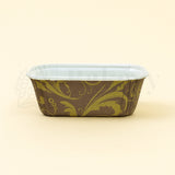 Rectangular paper container with decorative brown and green pattern on a beige background