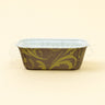 Rectangular paper container with decorative brown and green pattern on a beige background