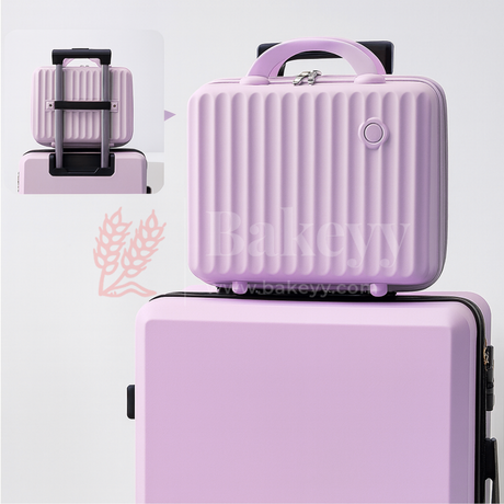 Purple suitcase with a smaller matching case on a light gray background