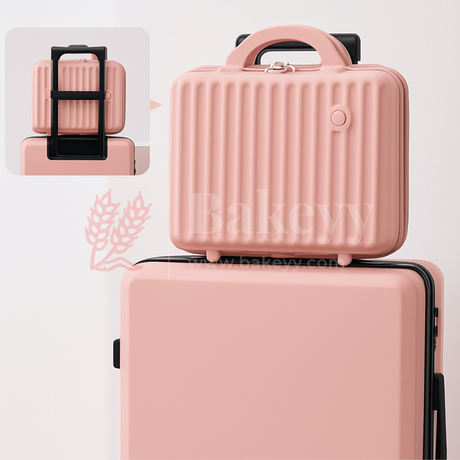 Pink suitcase with a smaller pink case on top against a white background