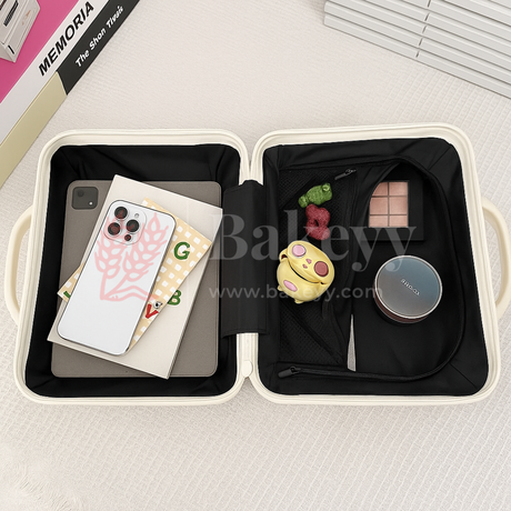 Small travel case with phone, stationery, and small toys on a light surface