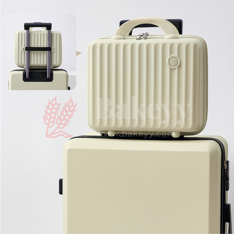 Beige suitcase with a smaller matching travel case on a white background