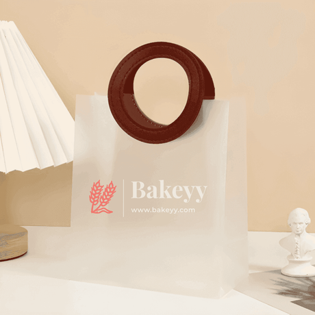 21x11x22 cm| Premium Transparent Gift Bags | Leather Style Maroon Colour Handles| Pack of 10| - Bakeyy.com - India - {{ variant.name }}