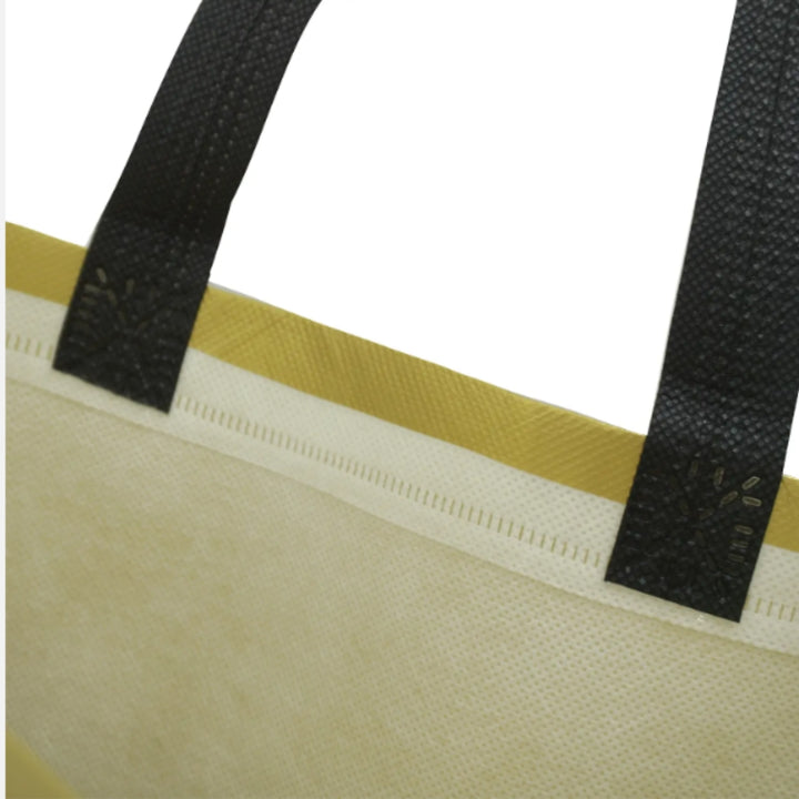 PVC Lamination Bags, Golden Bag with Black Handles, Non Woven Design, 4 sizes available - Bakeyy.com