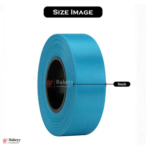 Roll of blue ribbon with a 1-inch width measurement on a white background, featuring the Bakeyy brand.