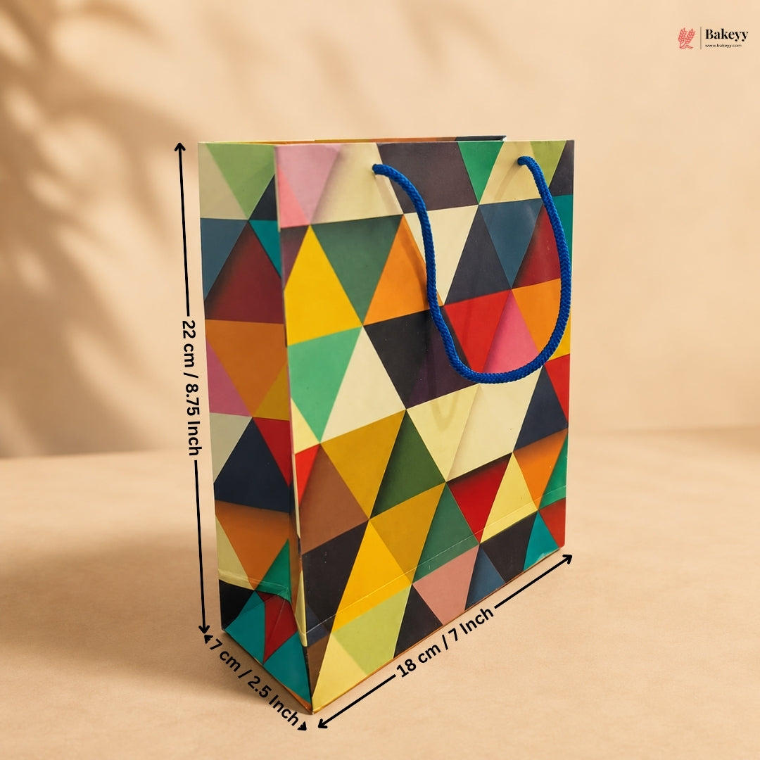 Colorful geometric-patterned paper bag with measurements on a beige background