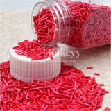 Red Color Vermicelli Sprinklers - Bakeyy.com - India - Red Color Vermicelli Sprinklers - 100 gm / Red