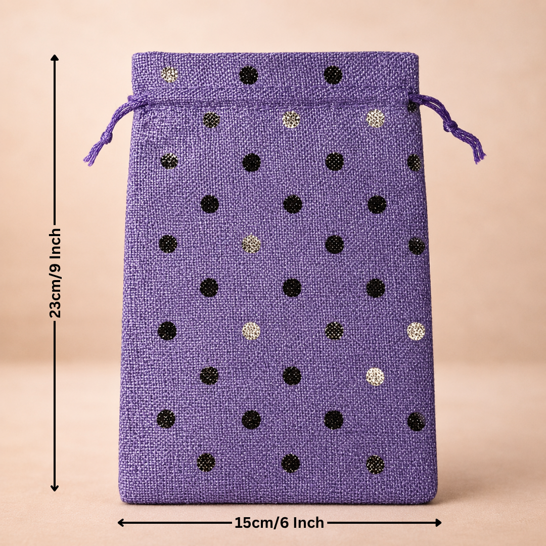 Purple drawstring bag with black and gold polka dots and measurements on a beige background